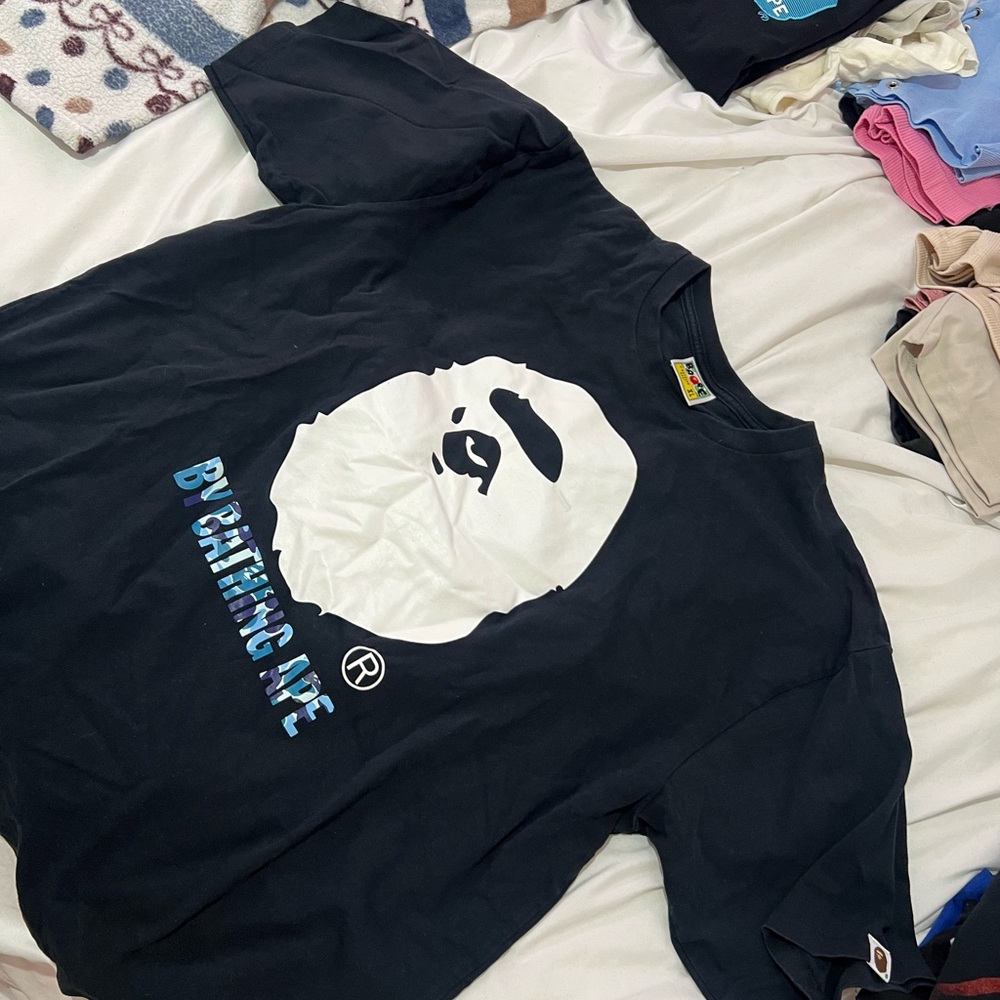 Black T-Shirt with White and Blue Logo